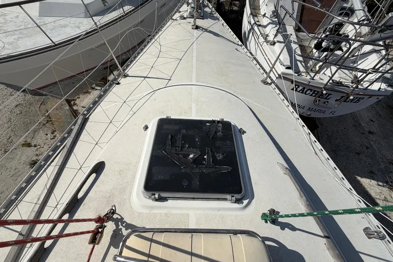 Slide: The Image of 1983 Morgan Catilina sailboat deck with hatch and rigging details. - 37