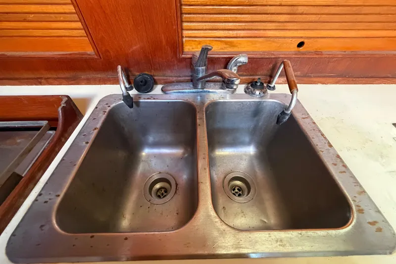 Slide: The Image of Stainless steel double sink in a 1983 Morgan Catilina boat kitchen. - 87