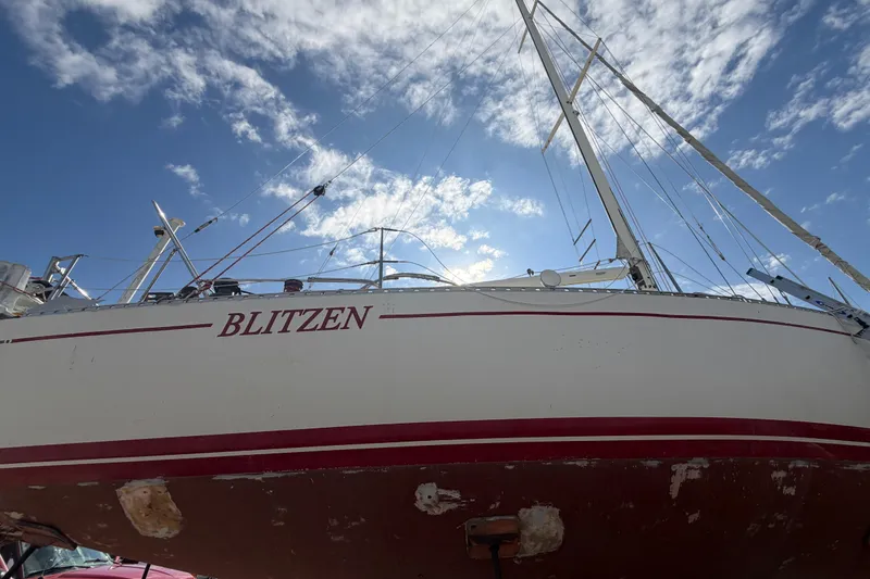 Slide: The Image of Sailboat "Blitzen" under blue sky, Morgan Catilina 1983 model. - 9