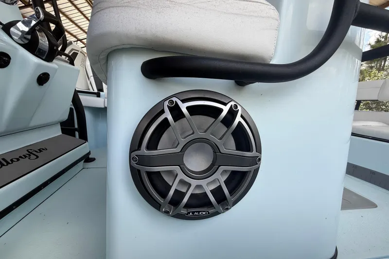 Slide: The Image of 2021 Yellowfin 26 Hybrid boat interior with JL Audio speaker detail. - 28