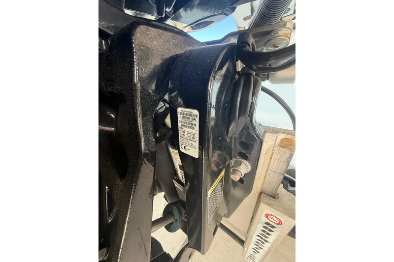 Slide: The Image of Close-up of 2021 Yellowfin 26 Hybrid boat engine component with visible serial number. - 43