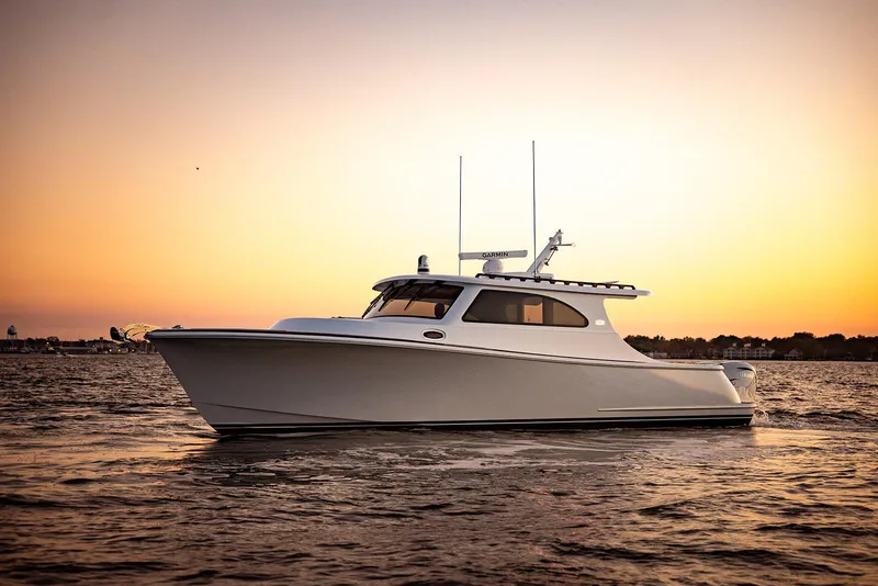 Slide: The Image of 2027 Composite Yacht CY39 cruising at sunset on calm waters. - 4
