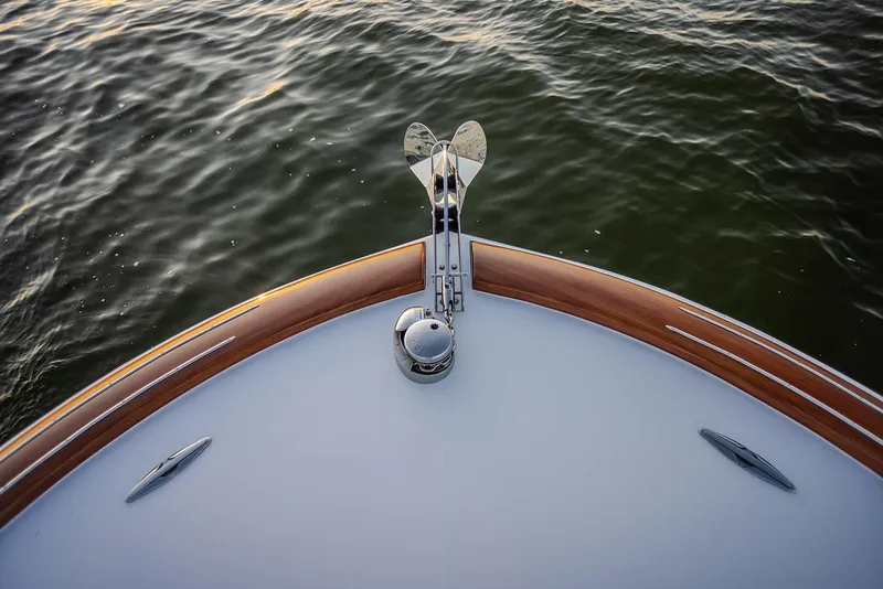 Slide: The Image of Bow of 2027 Composite Yacht CY39 on calm water, featuring sleek design. - 6