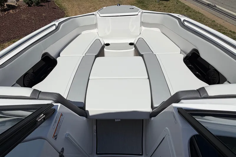 Slide: The Image of 2026 Yamaha Boats AR250 interior with spacious seating and modern design. - 10