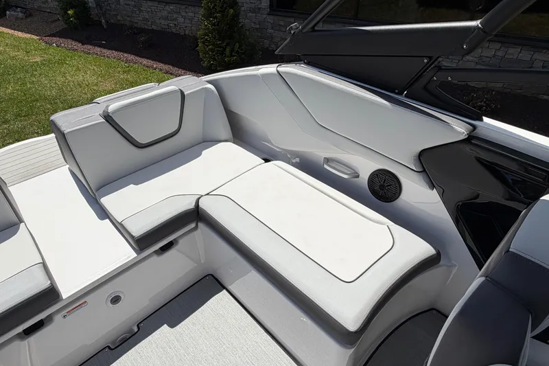 Slide: The Image of 2026 Yamaha Boats AR250 interior seating with sleek, modern design and comfortable upholstery. - 7
