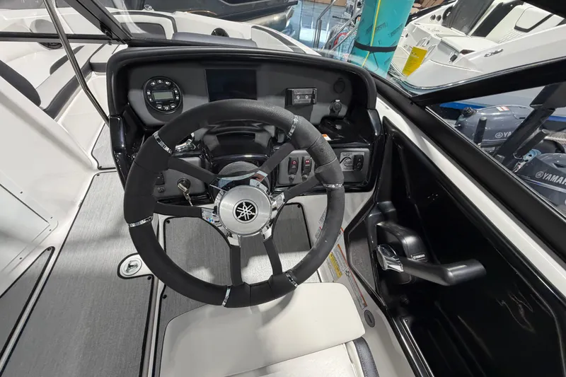 Slide: The Image of 2026 Yamaha Boats AR195 steering wheel and dashboard in a sleek, modern design. - 4