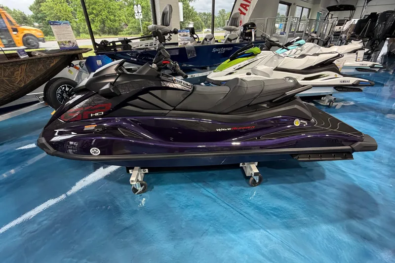 Slide: The Image of 2026 Yamaha WaveRunner GP HO jet ski displayed in showroom on blue floor. - 5