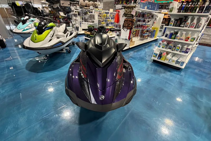 Slide: The Image of 2026 Yamaha WaveRunner GP HO displayed in a showroom with blue flooring. - 6