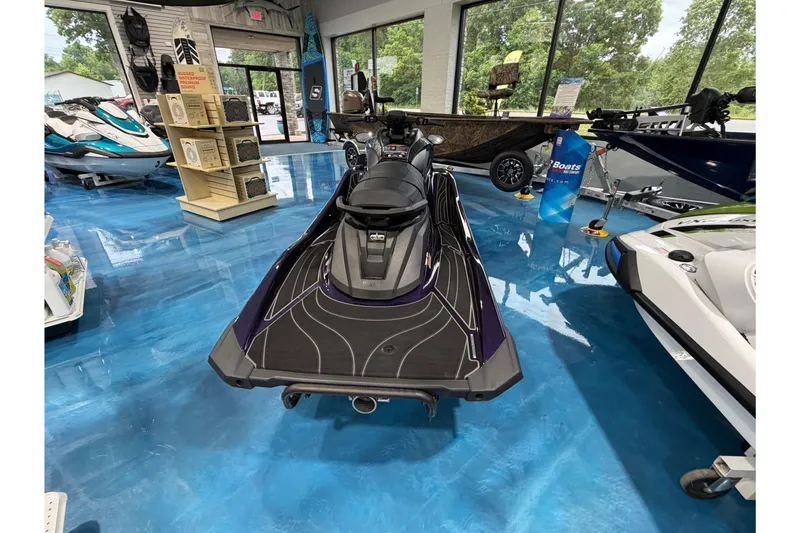 Slide: The Image of 2026 Yamaha WaveRunner GP HO displayed in a showroom with blue flooring. - 7