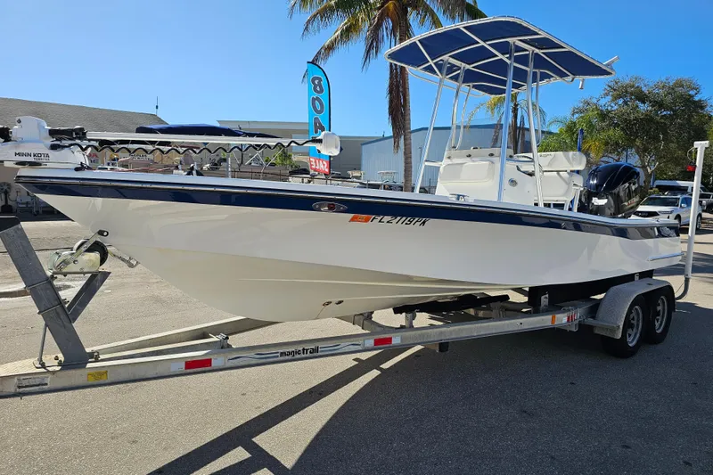 Slide: The Image of 2013 BlackJack 224 boat transom with Lenco trim tab and motor mount. - 11