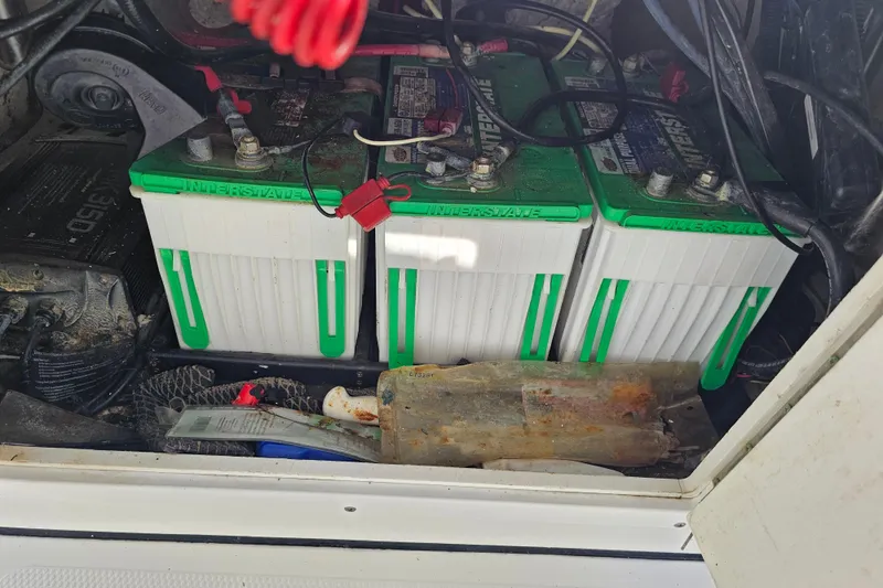 Slide: The Image of Three Interstate batteries in a BlackJack 224 boat, model year 2013. - 27
