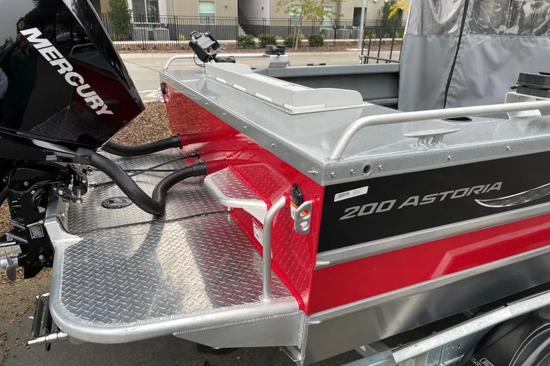Slide: The Image of 2024 Spartan 200 Astoria boat with Mercury engine, featuring sleek design and durable construction. - 19