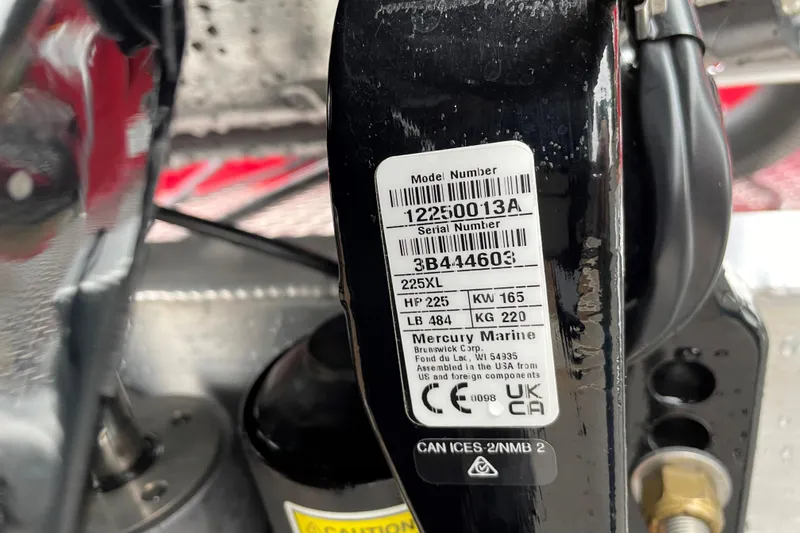 Slide: The Image of Label on Mercury Marine engine, model 225XL, with specifications and serial number. - 21