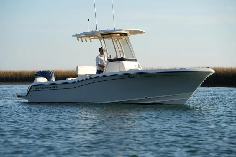 The Image of 2023 Grady-White Fisherman 216 boat on calm water, side view. - 0
