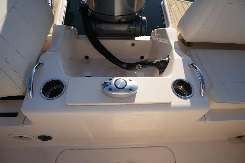 Slide: The Image of 2023 Grady-White Fisherman 216 boat interior with cup holders and seating. - 25