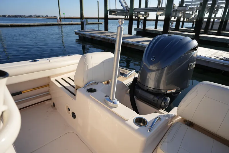 Slide: The Image of 2023 Grady-White Fisherman 216 boat with Yamaha outboard engine at dock. - 26