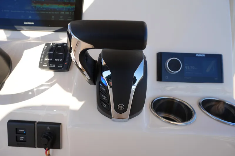 Slide: The Image of Control panel of 2023 Grady-White Fisherman 216 boat with throttle and display. - 37