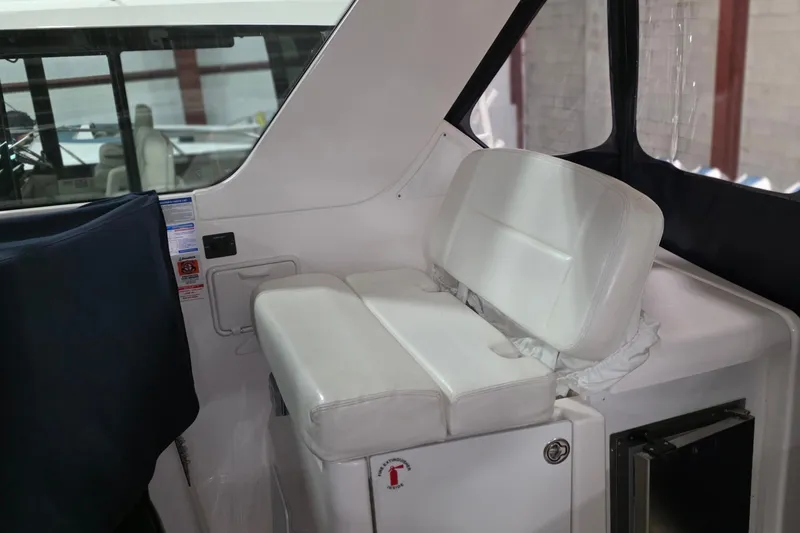 Slide: The Image of 2005 Tiara Yachts 3600 Sovran interior with white seating and modern design. - 21