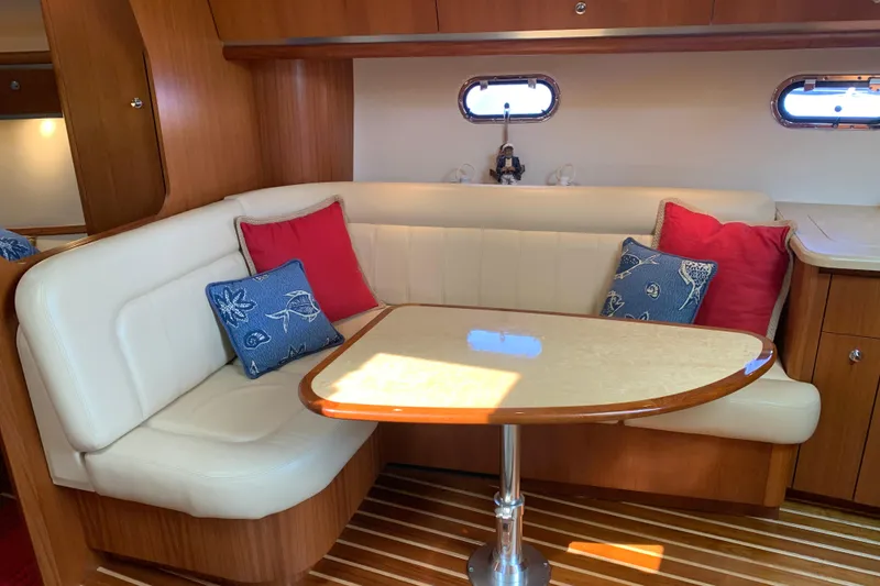 Slide: The Image of Luxurious 2005 Tiara Yachts 3600 Sovran interior with elegant seating and decorative cushions. - 27