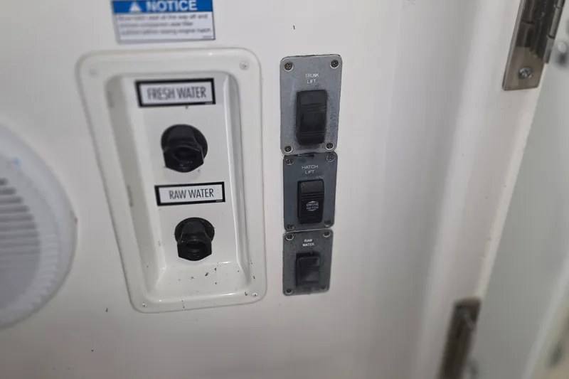 Slide: The Image of Control panel on a 2005 Tiara Yachts 3600 Sovran, featuring water and hatch switches. - 41