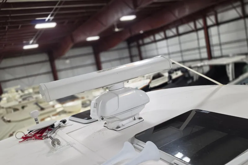 Slide: The Image of 2005 Tiara Yachts 3600 Sovran radar equipment in a boat storage facility. - 45