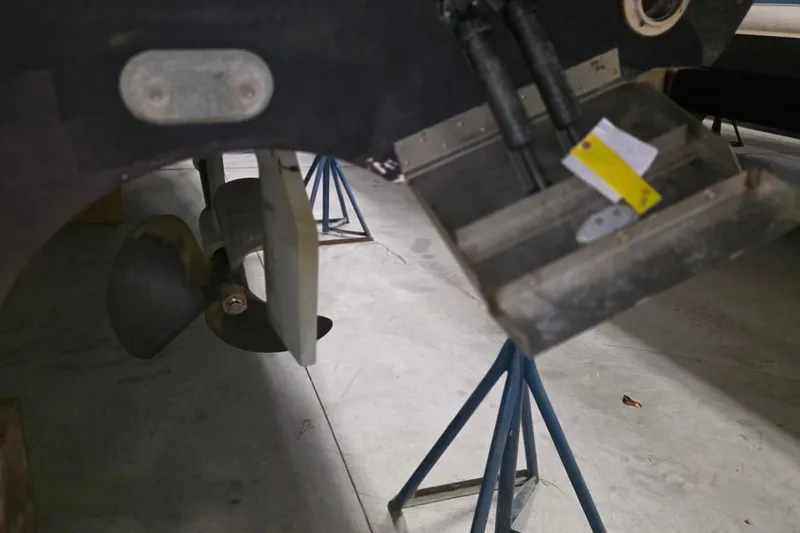 Slide: The Image of 2005 Tiara Yachts 3600 Sovran propeller and stern detail in a workshop. - 46