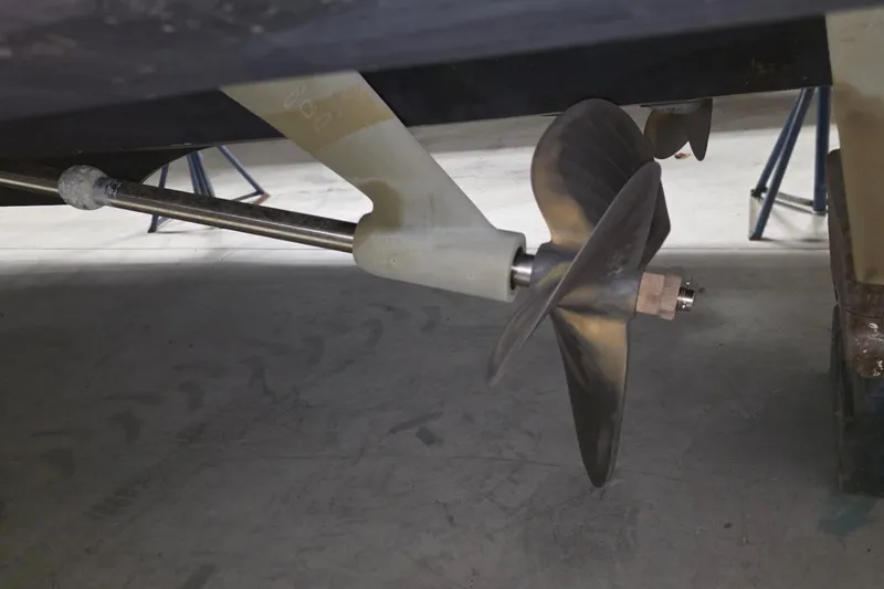 Slide: The Image of Propeller of 2005 Tiara Yachts 3600 Sovran on display in a workshop. - 47