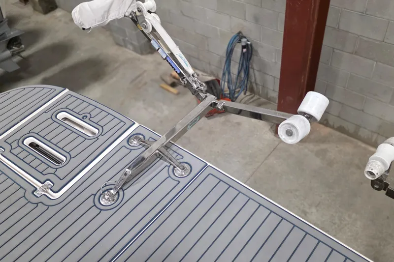 Slide: The Image of Tiara Yachts 3600 Sovran 2005 swim platform with stainless steel hardware in a workshop. - 53