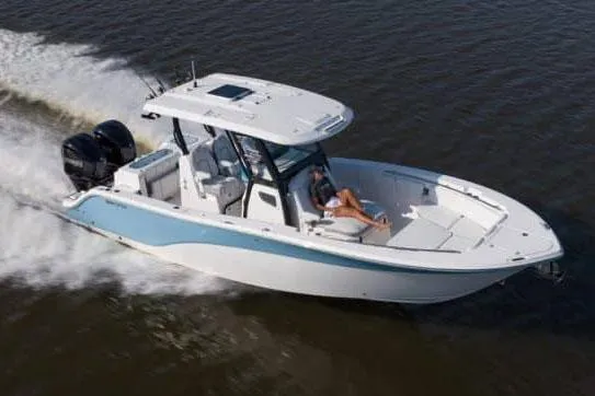 Slide: The Image of Manufacturer Provided Image: 2025 Sea Fox 288 Commander boat cruising on water, featuring sleek design and dual engines. - 1