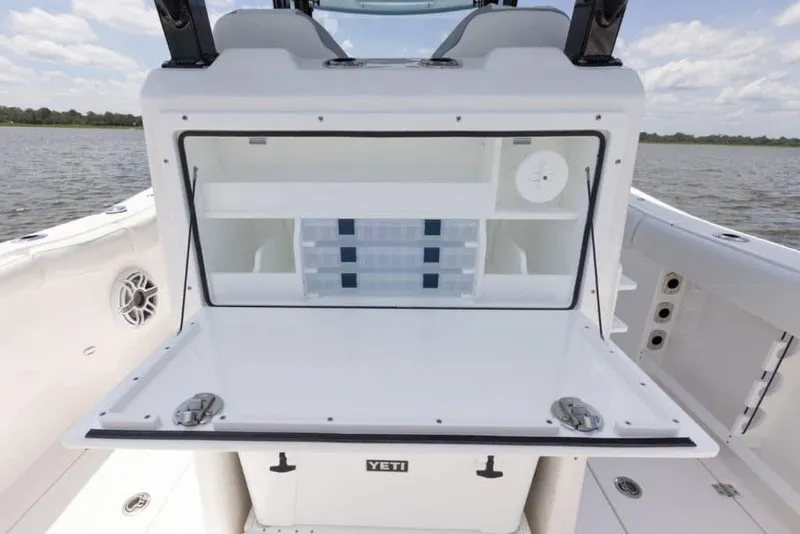 Slide: The Image of Manufacturer Provided Image: 2025 Sea Fox 288 Commander boat with open storage compartment on deck. - 11