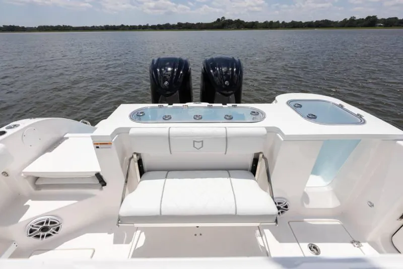 Slide: The Image of Manufacturer Provided Image: 2025 Sea Fox 288 Commander boat with dual engines on a calm lake. - 13