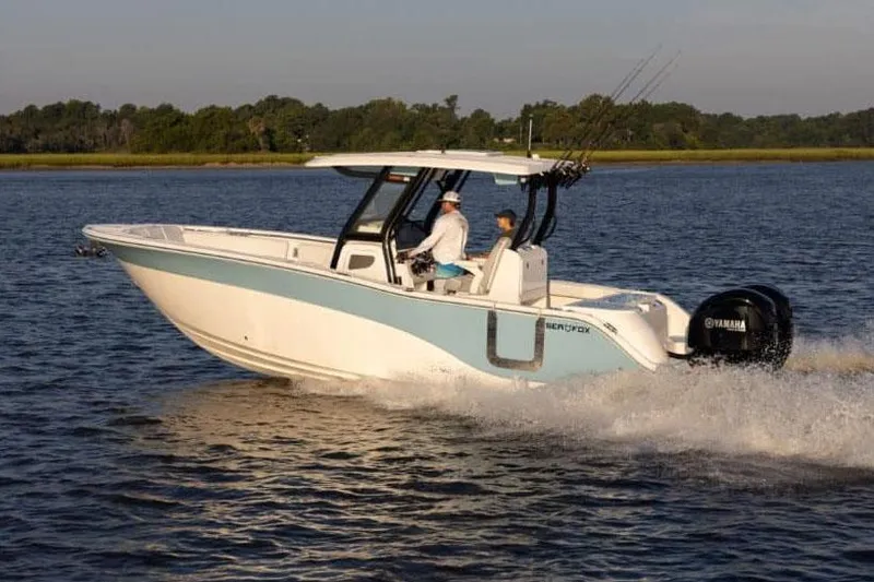 Slide: The Image of Manufacturer Provided Image: 2025 Sea Fox 288 Commander boat cruising on a lake. - 3