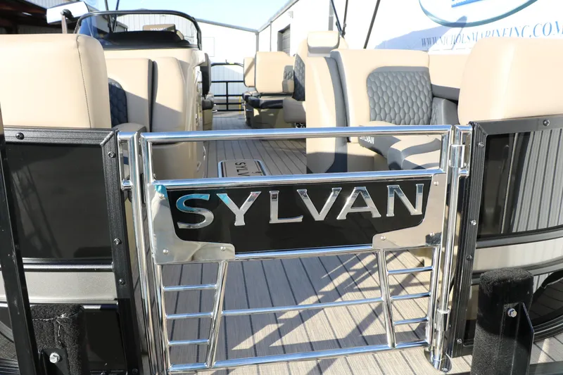 Slide: The Image of 2026 Sylvan L3 DLZ pontoon boat interior with luxurious seating and chrome accents. - 13