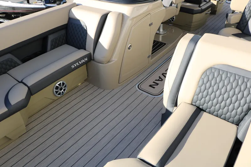 Slide: The Image of Luxurious interior of 2026 Sylvan L3 DLZ boat with plush seating and elegant design. - 15