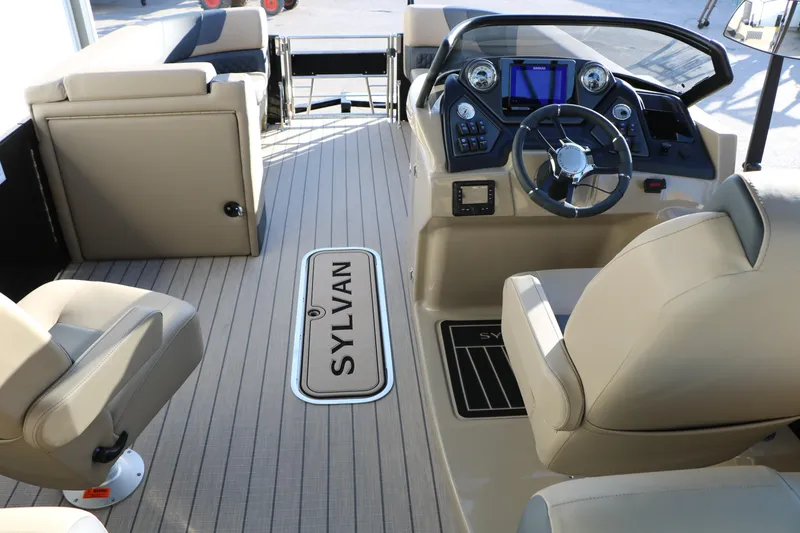 Slide: The Image of Interior of 2026 Sylvan L3 DLZ boat with modern helm and seating. - 19