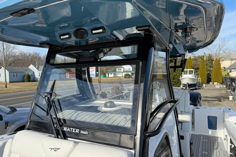 Slide: The Image of 2026 Tidewater 302 CC Adventure boat with sleek design and modern features. - 32