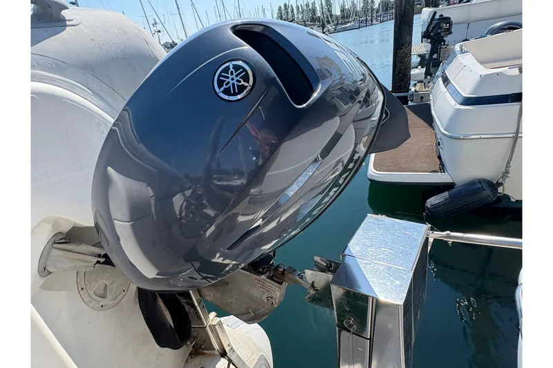 Slide: The Image of 1988 Bayliner 3587 Motoryacht with Yamaha outboard motor at marina dock. - 12