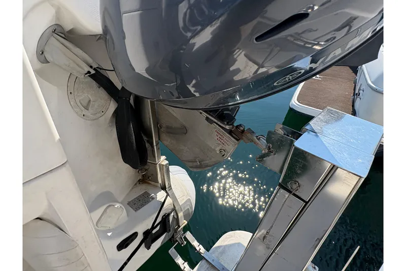 Slide: The Image of 1988 Bayliner 3587 Motoryacht engine detail with water reflection. - 16