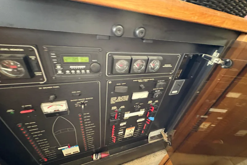 Slide: The Image of Control panel of a 1988 Bayliner 3587 Motoryacht with gauges and switches. - 66