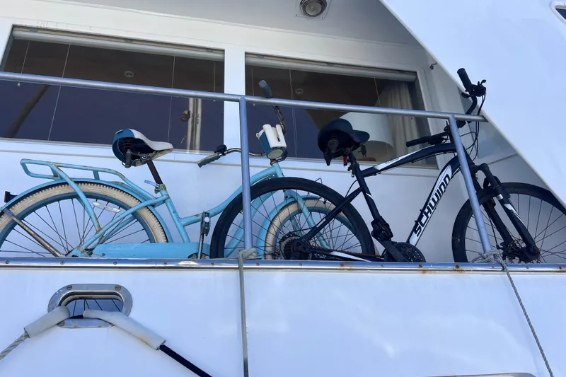 Slide: The Image of Two bicycles secured on a 1977 Huckins motor yacht deck. - 5
