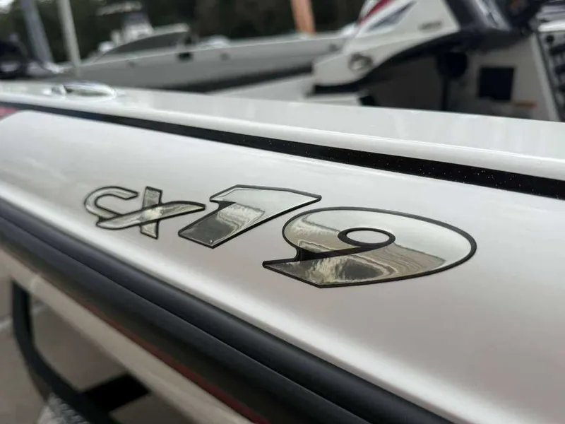 Slide: The Image of Close-up of Caymas CX 19 boat emblem, 2022 model. - 1