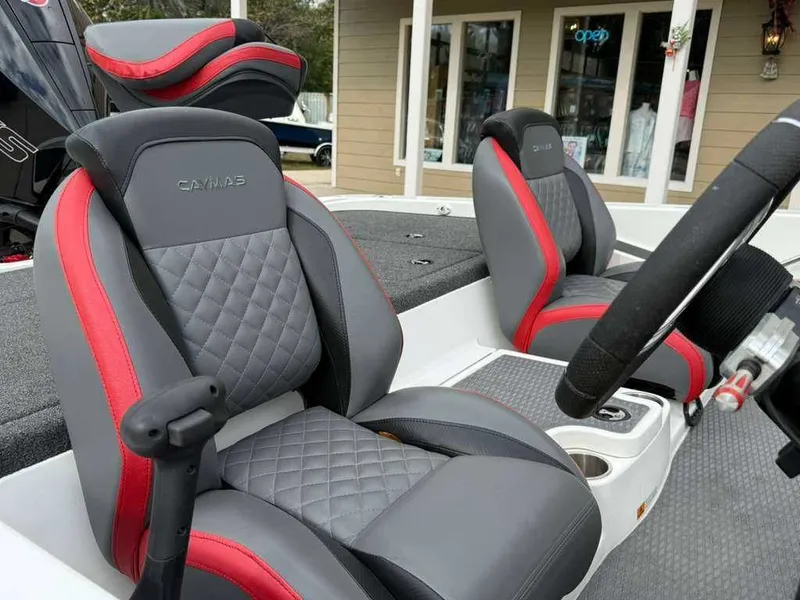 Slide: The Image of Interior of 2022 Caymas CX 19 boat with gray and red seats. - 10