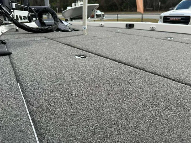 Slide: The Image of Deck of a 2022 Caymas CX 19 boat, close-up view. - 15