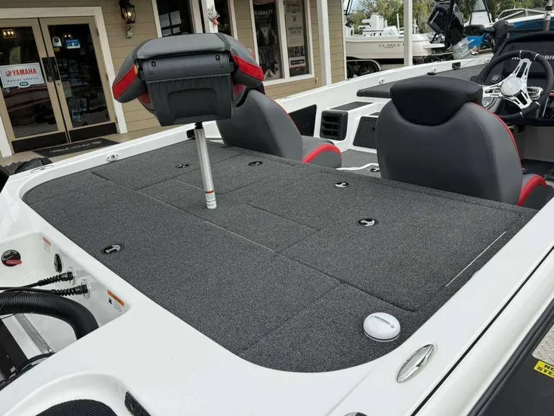 Slide: The Image of 2022 Caymas CX 19 boat with gray deck and seats. - 5