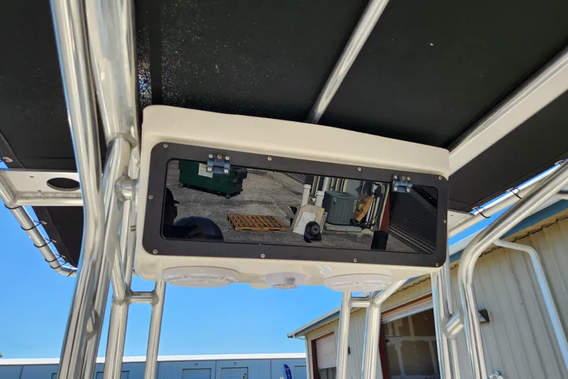 Slide: The Image of 2020 Key West 203 FS boat console with mounted electronics and speakers. - 22