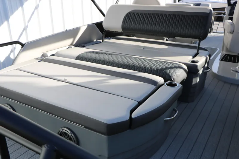 Slide: The Image of 2026 Sylvan L3 DLZ boat interior with luxurious seating and cup holders. - 17