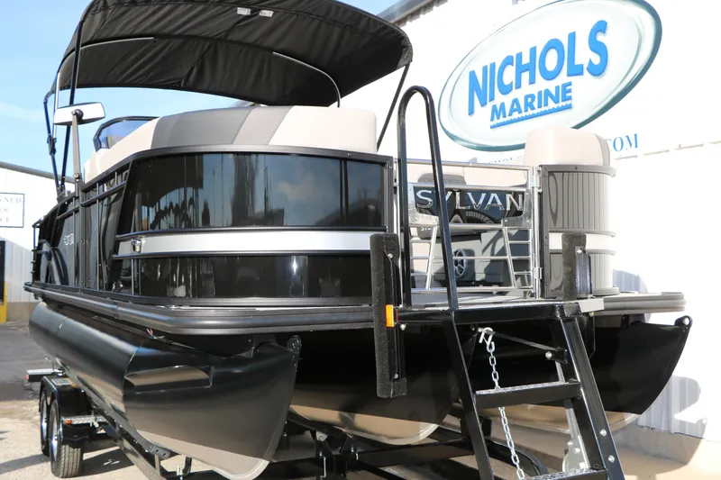 Slide: The Image of 2026 Sylvan L3 DLZ pontoon boat at Nichols Marine dealership. - 5