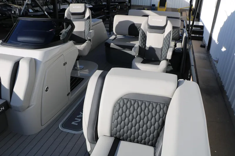 Slide: The Image of 2026 Sylvan L3 DLZ boat interior with luxurious seating and modern design. - 9