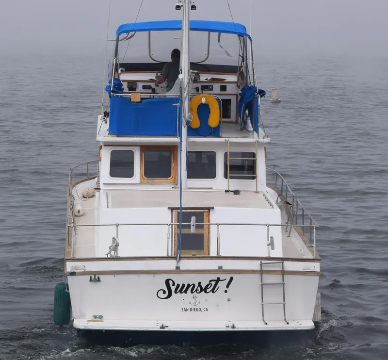 Slide: The Image of 1974 Californian 42 LRC boat named "Sunset" on misty water, San Diego. - 22