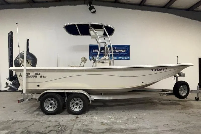 Slide: The Image of 2020 Carolina Skiff 21 LS boat on trailer in indoor showroom. - 0